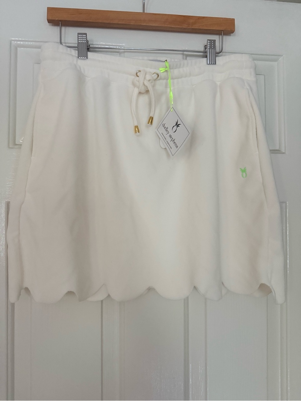 Dudley Stephens Cream Scallop Hem Mini Skirt with Neon Logo